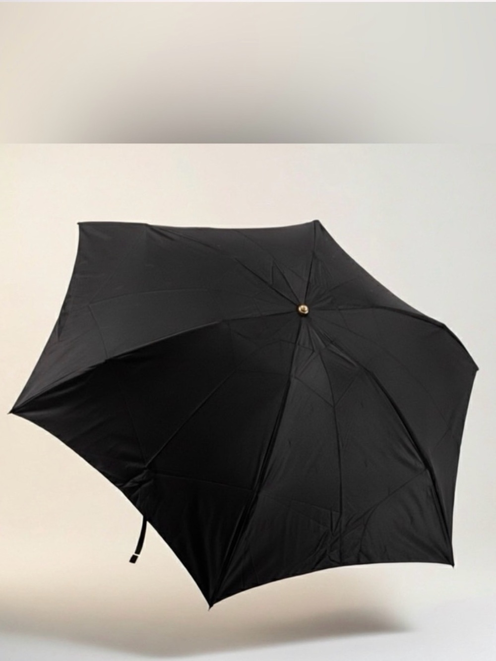 Authentic YSL Classic Black Compact Umbrella with the original bad and free COA.